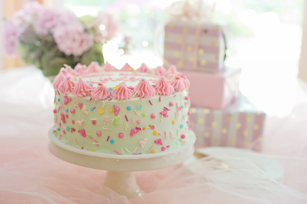 Cake with sprinkles on cake stand