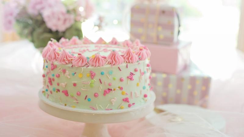 Cake with sprinkles on cake stand