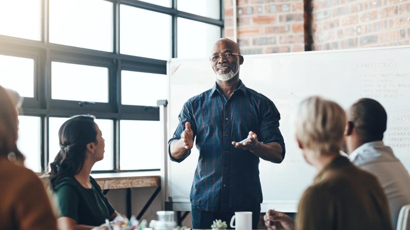 Man presenting to group